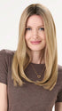 Model is wearing BARELY THERE STRAIGHT TOPPER in color VANILLA LATTE (17/101R8) | Rooted medium Blonde with Cool Platinum Dimension