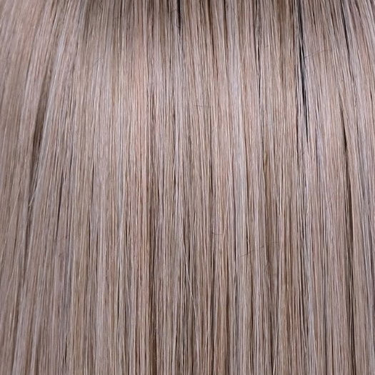 BRITISH-MILKTEA-R | Medium to light brown tones have been blended with different blonde shades to create the perfectly trendy “bronde.” The medium to light brown root color creates a natural look.