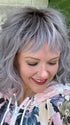 Marcie Mertz @wig.obsessed wearing BREEZY WAVEZ by RENE OF PARIS in color LUNAR-HAZE | Periwinkle Base with Off-Black Roots
