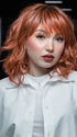 Maha host @ thewigcompany.com/LIVE in Breezy Wavez  by Rene of Paris | Color: DUSTY-ROSE | Medium Coral Red Base with Dark Brown Roots