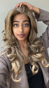 Shyla wearing BRIANNA by ENVY BY ALAN EATON in color FROSTED | Light Brown with Wheat Blonde blended highlights