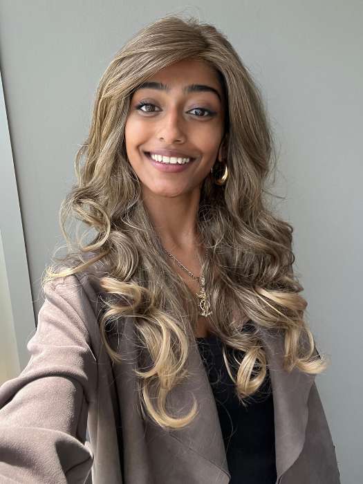 Shyla wearing BRIANNA by ENVY BY ALAN EATON in color FROSTED | Light Brown with Wheat Blonde blended highlights