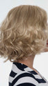 Embraces that retro glam look in this bouncy, mid-length "bob." 