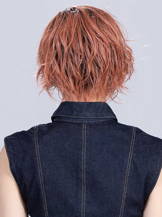 Model is in ROSE BLUSH ROOTED | Light copper, Peach, and Soft Rose Gold tones with subtle Golden Undertones and Shaded Roots