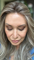 Emily H. @she_sheds_more wearing ROBERTS by BELLE TRESS in color BROWN SUGAR BLONDE-R | A warm, dimensional blend of medium brown and golden blonde highlights with natural-looking darker roots for depth and a sun-kissed finish.