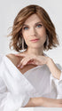 Model is wearing ESPRIT SOFT SMALL by ELLEN WILLE in color CHOCOLATE LIGHTED 830.6.27 | Dark and Medium Brown Blended with Light Auburn Brown and Dark Strawberry Blonde with Highlights Throughout and Concentrated in the Front