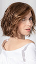 Model is wearing ESPRIT SOFT SMALL by ELLEN WILLE in color CHOCOLATE LIGHTED 830.6.27 | Dark and Medium Brown Blended with Light Auburn Brown and Dark Strawberry Blonde with Highlights Throughout and Concentrated in the Front
