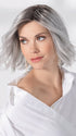 Model is wearing ESPRIT SOFT SMALL by ELLEN WILLE in color METALLIC GREY ROOTED 60.51 |  Pearl White, Darkest/Lightest Brown with Grey Blend with Shaded Roots