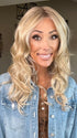Nichole Corbett @nicholealee wearing HANA by NORIKO in color NM SANDY CREAM BLOND-R | This shade features soft golden sand tones with subtly rooted color for a natural regrowth effect. This blend of beige brown, honey, and creamy blonde transitions beautifully into lighter shades, creating a warm, versatile look that flatters any skin tone. A perfect choice for effortless, honey-warm blonde style.