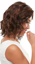 Effortless beach waves creating a casual chic look on this mid-length wig