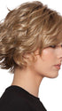 A short-layered style with soft curls and a long off-center bang