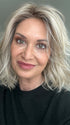 Emily H. @she_sheds_more wearing LORYN by RENE OF PARIS in shade SEA-SALT-BLOND-R | A perfect mixture of cool, icy-blond and warm-dark blond. The rich brown root tone enhances the modern appearance
