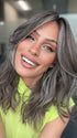 Model is wearing MAUDE by AMORE in color MUSHROOM-GREY-R |  Dark brown incorporates light brown and silvery grey tones with shadow roots for a stylish finish.