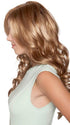 Accentuated by a chic side part, locks flow boldly and beautifully