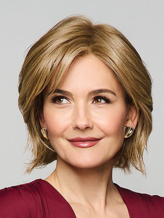 Model is wearing MAIN CHARACTER by RAQUEL WELCH in RL 13/88 GOLDEN PECAN | Neutral Medium Blonde With Pale Honey Blonde Highlight