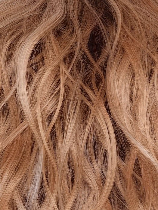 PEACHES AND CREAM | A vibrant Peach Blonde with creamy undertones and bright, face-framing cream highlights. Rich Chocolate root adds depth.