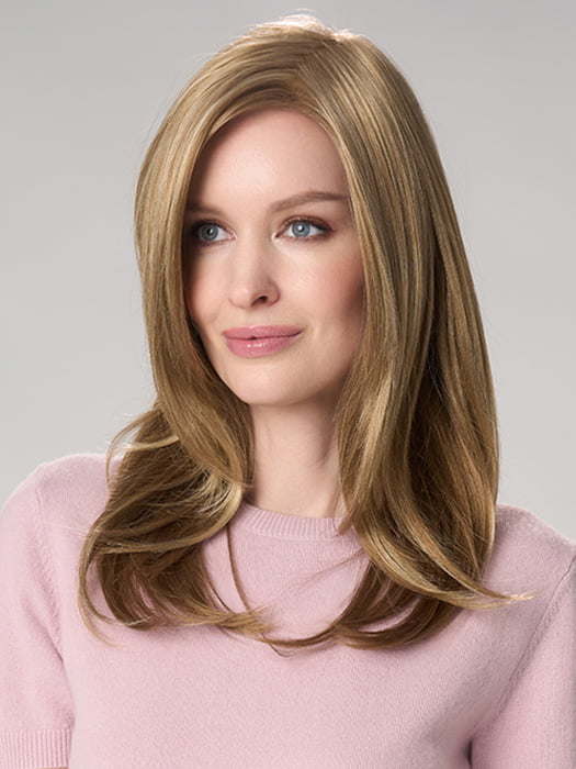 Model is wearing BELINDA HAND TIED by ENVY in color DARK BLONDE | 2 toned blend of Dark Honey Blonde with Lighter Blonde highlights
