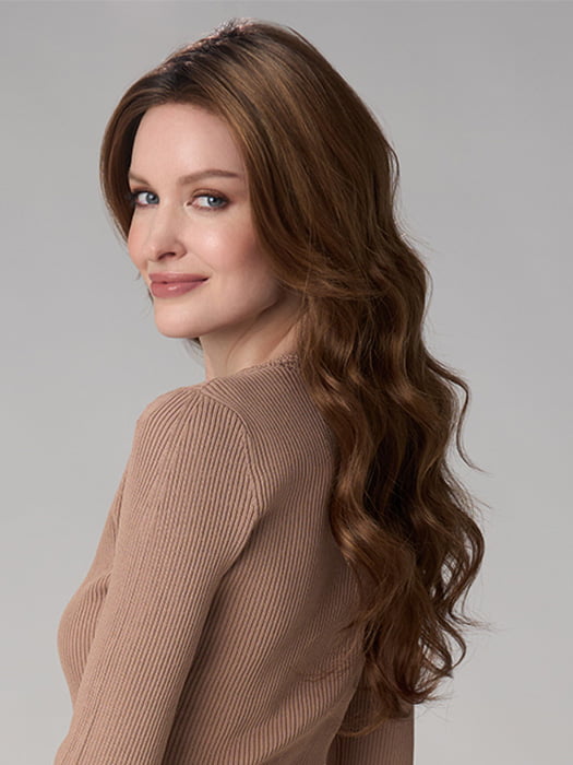 Model is wearing BRIANNA HAND TIED by ENVY in color CINNAMON TOFFEE | Neutral to Warm Light Brown with Dark Brown Roots
