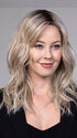 Model is wearing CAMPBELL by BELLETRESS in color BUTTERBEER R | Dark Brown Base and Root that transitions smoothly into a buttery blonde, infused with creamy honey and toffee tones