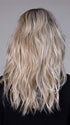 Model is wearing CAMPBELL by BELLETRESS in color BUTTERBEER R | Dark Brown Base and Root that transitions smoothly into a buttery blonde, infused with creamy honey and toffee tones