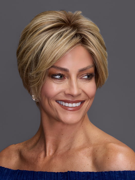 Model is wearing DEMI by JON RENAU in color 12FS8 SHADED PRALINE | Medium Natural Gold Blonde, Light Gold Blonde, Pale Natural Blonde Blend, Shaded with Dark Brown