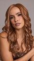 Model is wearing ESME by RENE OF PARIS in color CARAMEL COPPER | One‑tone Caramel Copper shade enhanced with ultra‑fine Cream Blonde highlights
