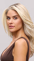 Model is wearing FIONA LITE by JON RENAU in color 101/88/27S8 CATALINA BLONDE | Pale blonde with Pure White Natural Violet halo highlights, shaded medium brown