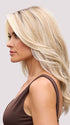 Model is wearing FIONA LITE by JON RENAU in color 101/88/27S8 CATALINA BLONDE | Pale blonde with Pure White Natural Violet halo highlights, shaded medium brown