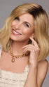 Model is wearing WAVER by GABOR in color SS-MEDIUM-BLONDE | Medium Blonde with Warm Highlights & Dark Brown Roots