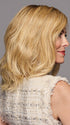 Model is wearing WAVER by GABOR in color SS-MEDIUM-BLONDE | Medium Blonde with Warm Highlights & Dark Brown Roots