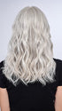 Model is wearing 16" AU NATUREL WAVES TOPPER by HAIRDO in color R56/60 SILVER MIST | Lightest Gray with 20% Medium Brown Evenly Blended with Pure White