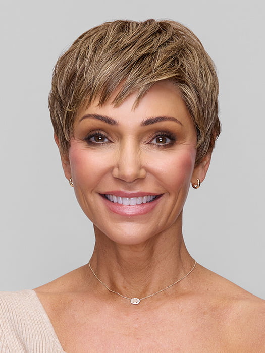 Model is wearing IRIS by JON RENAU in color 10RH16 CAFFE MOCHA | Light Brown with 33% Light Natural Blonde Highlights