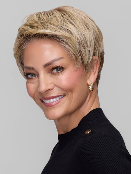 Model is wearing IRIS by JON RENAU in color 12FS12 MALIBU BLONDE | Light Gold Brown, Light Natural Gold Blonde, Pale Natural Gold-Blonde Blend, Shaded with Light Gold Brown