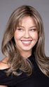 Model is wearing MARSEILLE by BELLETRESS in color MACADAMIA LATTE R | A combination of Medium and Light Brown, highlighted with Light Gold Blonde, and a mixture of Ash Blonde and Light Gold Blonde, Rooted with Medium and Light Brown
