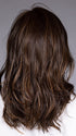Model is wearing MUNICH by BELLETRESS in color MOCHA MAPLE BROWN | A mix of Dark Brown, Medium Brown, Light Auburn, Medium Strawberry