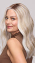 Model is wearing MORGAN by JON RENAU in color 101/88/27S8 CATALINA BLONDE | Pale blonde with Pure White Natural Violet halo highlights, shaded medium brown
