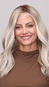 Model is wearing MORGAN by JON RENAU in color 101/88/27S8 CATALINA BLONDE | Pale blonde with Pure White Natural Violet halo highlights, shaded medium brown