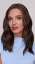 Model is wearing MORGAN by JON RENAU in color FS4/33/30A MIDNIGHT COCOA | Dark Brown, Medium Red, Medium Natural Red Blonde/Brown Blend with Medium Natural Red Blonde/Brown Blend Bold Highlights