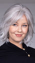 Model is wearing NAPLES by BELLETRESS in color OYSTER GRAY | A mixture of Lightest Gray and a hint of White