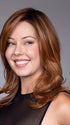 Model is wearing PRAGUE by BELLETRESS in color SIENNA SPICE R | True Light Strawberry Blonde/Red with Low Light and Highlights