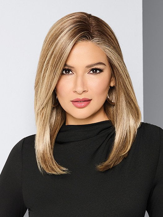 Model is wearing BOX OFFICE BEAUTY by RAQUEL WELCH in color SS1621 SHADED SAND | Light Blonde shaded with Medium Brown