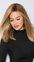 Model is wearing BOX OFFICE BEAUTY by RAQUEL WELCH in color SS1621 SHADED SAND | Light Blonde shaded with Medium Brown