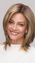 Model is wearing SLOANE by JON RENAU in color 24BT18S8 SHADED MOCHA | Medium Natural Ash Blonde & Light Natural Gold Blonde Blend, Shaded with Medium Brown