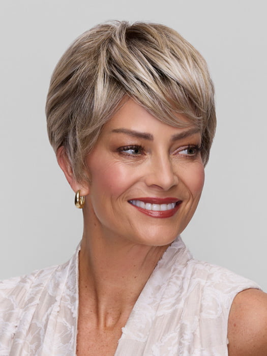 Model is wearing TESS by JON RENAU in color FS17/101S18 PALM SPRINGS BLONDE | Light Ash Blonde with Pure White Natural Violet Bold Highlights, Shaded with Dark Natural Ash Blonde