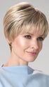 Model is wearing TIFFANY HAND TIED by ENVY in color SILKY BEIGE | Light Platinum Blonde with Dark Brown Roots