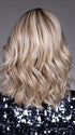 Model is wearing VIVIENNE by BELLETRESS in color BUTTERBEER R | Dark Brown Base and Root that transitions smoothly into a buttery blonde, infused with creamy honey and toffee tones