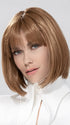 Model is wearing MISS COMFORT by ELLEN WILLE in color ALMOND BROWN ROOTED 830.9 | Medium Brown, Light Auburn and Medium Warm Brown Blend with Shaded Roots