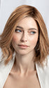 Model is wearing Supreme Plus Deluxe in color TOBACCO ROOTED 12.26.27 | Medium Brown Blended with Light Auburn, Lightest Brown, and Dark Strawberry Blonde Blend with Shaded Roots