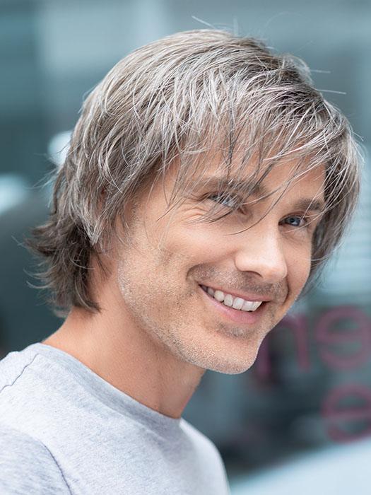 This synthetic piece has longer ends that can be worn off the face