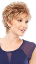 A short, classic style with all-over layering and soft, short curls with subtle feathering